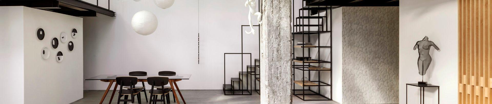 Modern black and white loft apartment tiled with porcelain stoneware | Casalgrande Padana