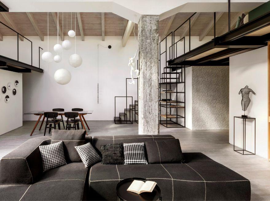 Modern black and white loft apartment tiled with porcelain stoneware | Casalgrande Padana